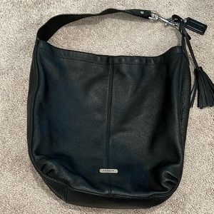 Black peddled soft leather COACH purse